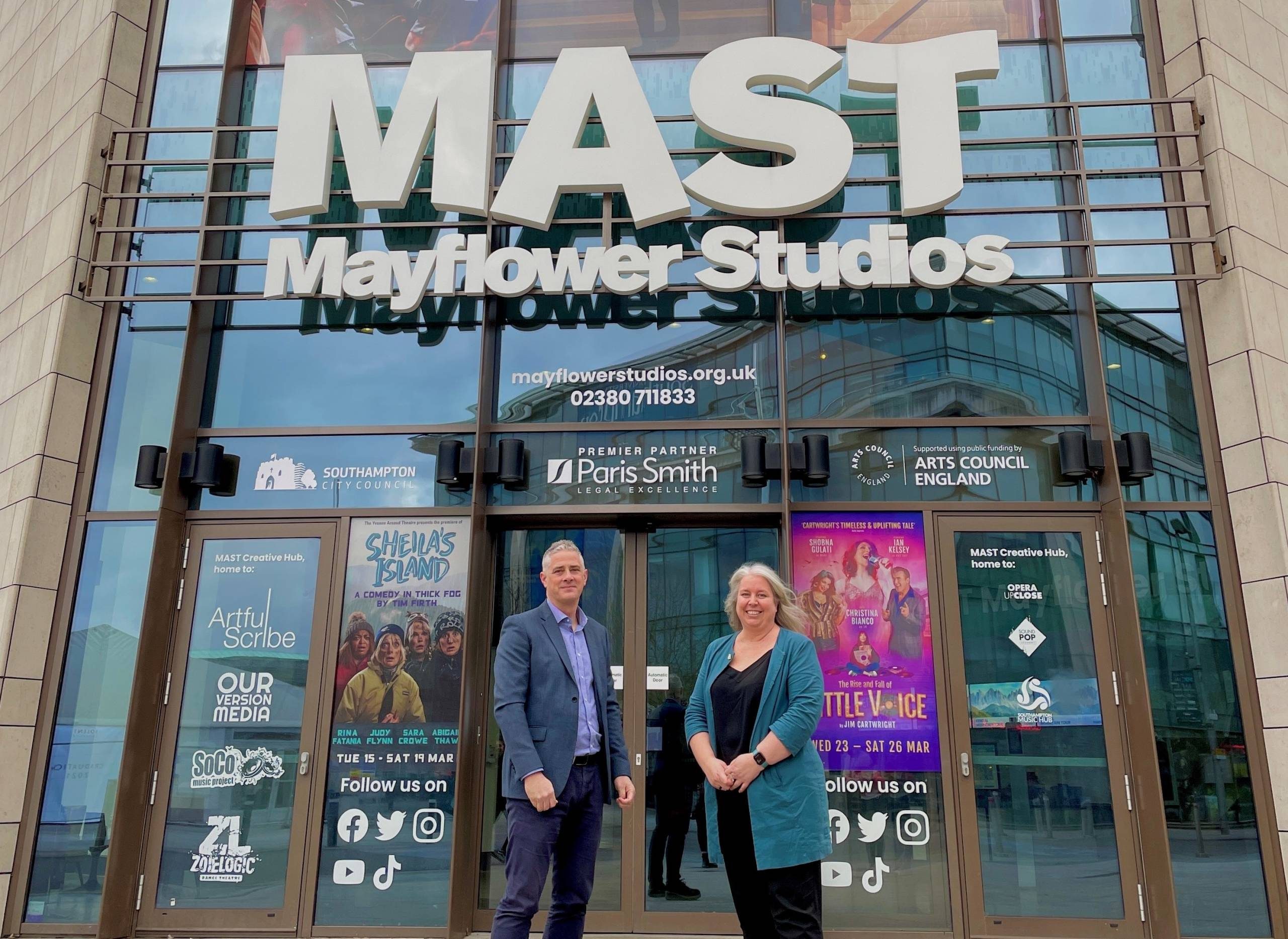 Sara Scott and Brooks Macdonald representative stand outside MAST looking at the camera.