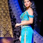 Desmonda Cathabel as Princess Jasmine, looking over her shoulder.